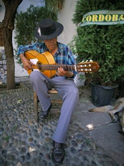 Head Piece Prints: Man playing guitar