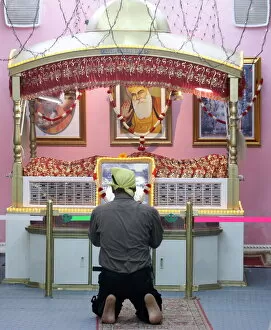 Images Dated 2nd May 2008: Man praying in Sikh Temple, Dubai, United Arab Emirates, Middle East