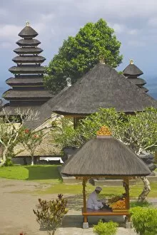 Man reading at Besakih Temple (Mother Temple), Bali, Indonesia, Southeast Asia, Asia