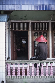 Conical Hat Prints: Man ready to work the rice paddies at Sungai Pinang, a traditional Indonesian village