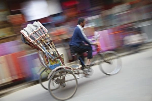 Tilted Image Prints: Man riding rickshaw, Kathmandu, Nepal, Asia