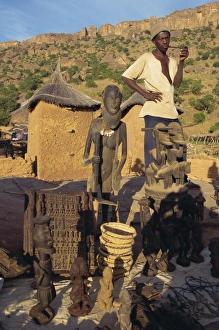 Smoking Prints: Man selling Dogon souvenirs, Mali, Africa