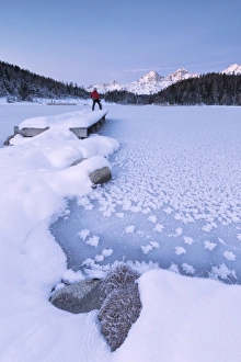 Typically Swiss Prints: Man standing on the shore of frozen lake