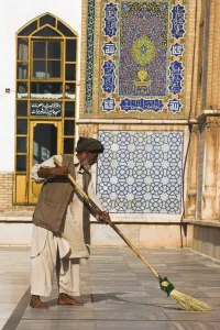Afgani Prints: Man sweeping, Friday Mosque or Masjet-eJam, Herat, Herat Province, Afghanistan, Asia