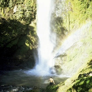 Costa Rican Prints: Man takes a bath in waterfall, Los Chorros Falls, Poas Valley, Costa Rica