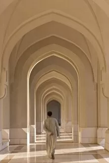 Man walking along a passageway in the Sultans Palace