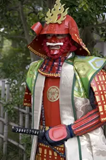 Costumes Prints: Man wearing warrior costume posing for photos during a festival in Odawara, Japan, Asia