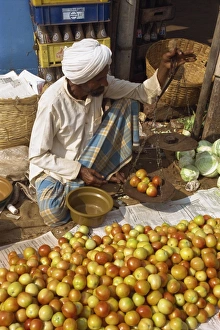 Small Business Prints: Man weighing tomatoes on scales