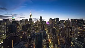 Chrysler Building Prints: Manhattan skyline with the Chrysler Building and Empire State Building at dusk