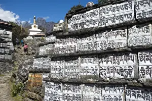 Mani stones inscribed with an ancient Buddhist mantra decorate the trail to Everest Base Camp