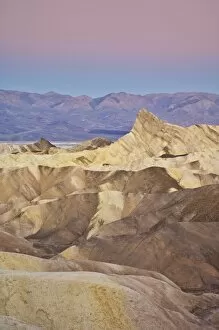 Images Dated 8th October 2010: Manly Beacon and the Siltstone eroded foothills formations at Zabriske Poin at sunrise