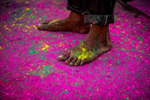 Low Section Prints: Mans bare feet during the color pigment throwing festival, Holi Festival, Vrindavan