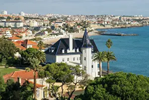 Nearby Prints: Mansion overlooks the sea and beach in Cascais near Lisbon Portugal on a clear day