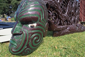 North Island Prints: Maori carving of a face, canoe, Okahu Bay, Auckland, North Island, New Zealand, Pacific