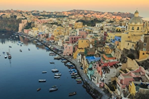 Procida Prints: Marina Corricella at sunrise, fishing village, colourful houses, church and harbour boats
