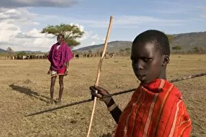 Images Dated 30th September 2008: Masai boy with his father, Masai Mara, Kenya, East Africa, Africa