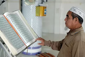 Looking Away Gallery: Masjid Nurul Naim Mosque, Imam reading the Quran, Phnom Penh, Cambodia, Indochina