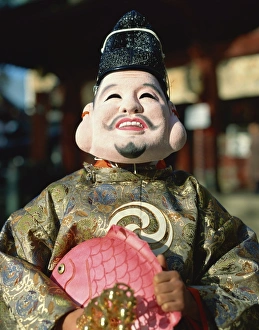 Costumes Prints: Masked figure at festival, Japan, Asia