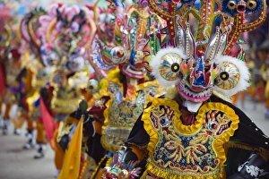 Masked performers in a parade at Oruro Carnival, Oruro, Bolivia, South America