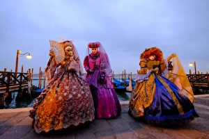 Carnival Prints: Masks and costumes at St. Marks Square during Venice Carnival, Venice, Veneto, Italy