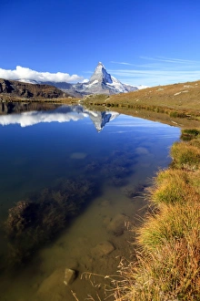 The Matterhorn reflected in Stellisee, Zermatt, Canton of Valais, Pennine Alps, Swiss Alps