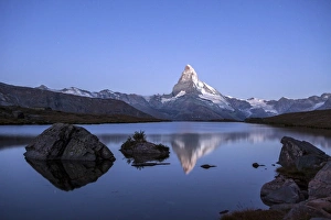 The Matterhorn reflected in Stellisee at sunrise, Zermatt, Canton of Valais, Pennine Alps