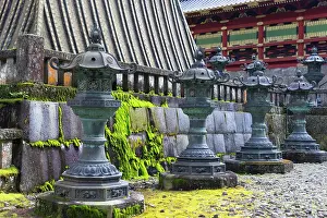 Pedestrian Prints: Mausoleum of Iemitsu stone lanterns at Rinnoji Temple in Nikko Tochigi Japan with moss and stone features