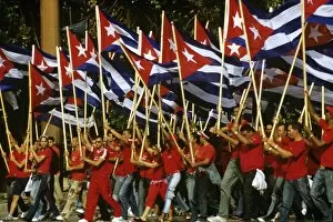 Images Dated 16th June 2010: May Day marchers with Cuban flags, Plaza de la Revolucion, Havana, Cuba