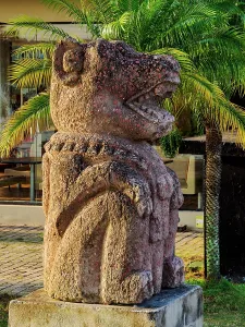 Crafts Prints: Maya sculpture displayed at a shopping area in Santa Elena