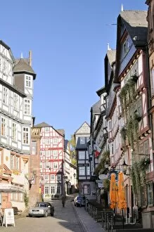 Images Dated 18th October 2009: Medieval buildings on Mainzer street viewed from the Market square, Marburg, Hesse, Germany, Europe