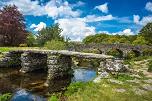 Connections Prints: Medieval clapper bridge over the East Dart River at Postbridge on Dartmoor in Devon