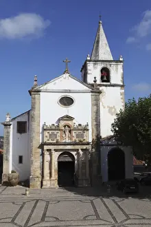 The medieval St. Mary Church (Igreja de Santa Maria) in centre of the walled city of Obidos, Estremadura, Portugal, Europe