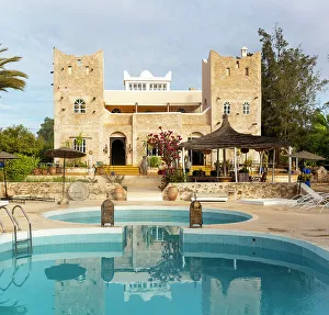 Swimming Pool Prints: Out of Medina riad (hotel) swimming pool and building
