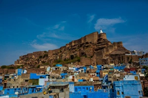 Mehrangarh Fort towering over the blue rooftops in Jodhpur, the Blue City, Rajasthan