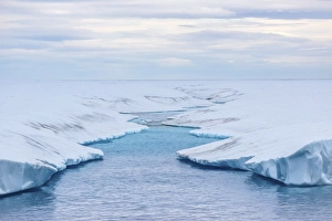 Nunavut Prints: Melt water stream in tabular iceberg in Isabella Bay