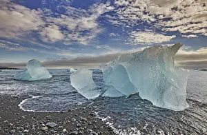 Melting glacial ice, carved from the Vatnajokull icecap, on the beach at Jokulsarlon