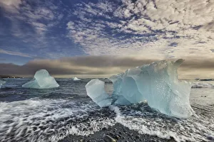 Melting glacial ice, carved from the Vatnajokull icecap, on the beach at Jokulsarlon