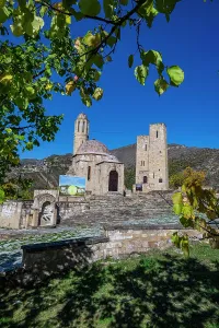 Walkway Prints: Memorial complex stands in Dagestan with stone structures and clear blue sky nearby Sogratl