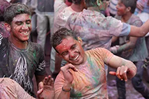 Typically Indian Gallery: Men celebrating Holi festival, Barsana, Uttar Pradesh, India, Asia