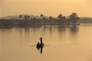 Deo Garh Prints: Men fishing in lake created by dam