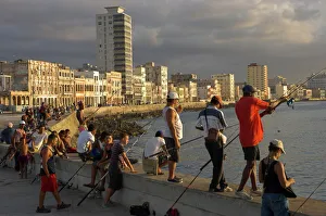 Fishing Prints: Men fishing at sunset, Avenue Maceo, El Malecon, Havana, Cuba, West Indies