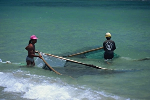 Fishing Nets Prints: Men net fishing at Candidasa, Bali, Indonesia, Southeast Asia, Asia