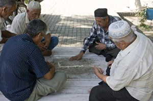 Images Dated 9th August 2009: Men playing dominos, Bokhara, Uzbekistan, Central Asia, Asia