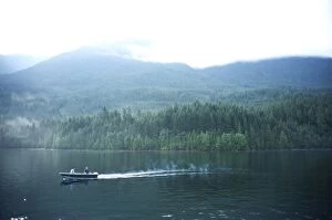 Images Dated 25th July 2009: Two men troll for fish on Ross Lake, North Cascades National Park, Washington