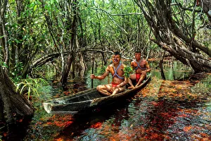 2 People Prints: Men from the Yanomami tribe in a canoe, southern Venezuela, South America