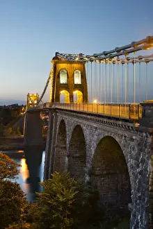 Menai Suspension Bridge at night, built in 1826 by Thomas Telford, Bangor, Gwynedd