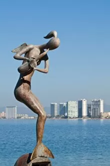 Images Dated 10th November 2010: Mermaid Angel Playing Saxophone sculpture on the Malecon, Puerto Vallarta, Jalisco, Mexico