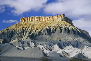 Mother Nature Prints: Mesaverde Sandstone cliff over gullied slopes of grey Mancos Shale