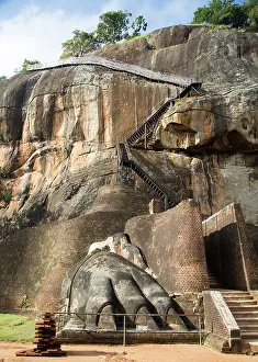 Ancient Ruins Prints: Metal staircase climbing to rock palace fortress