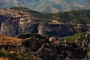 Pillars Prints: Meteora monasteries on rock pillars with rugged cliffs and green hills in Thessaly, Greece